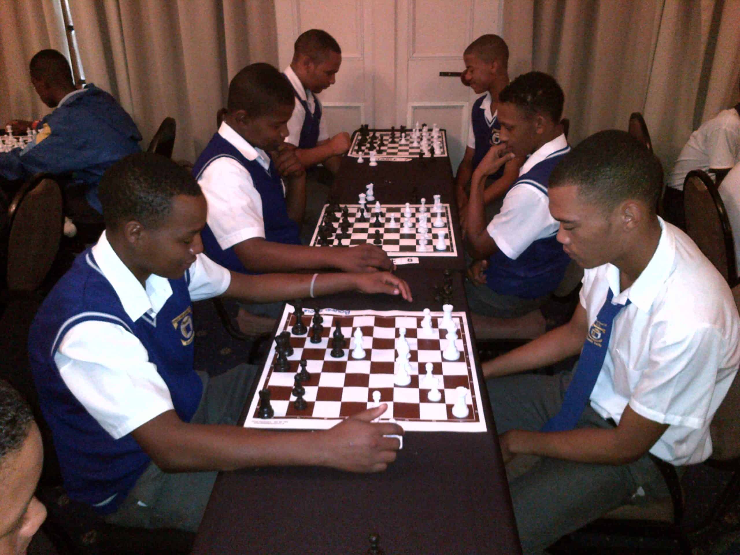 High school boys playing chess at The Caledon